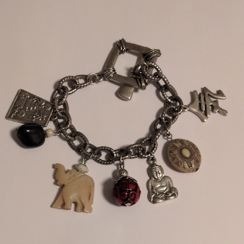 Silver Asian Theme Charm Bracelet – Buddha, Elephant,‎ Om & Mixed Charms